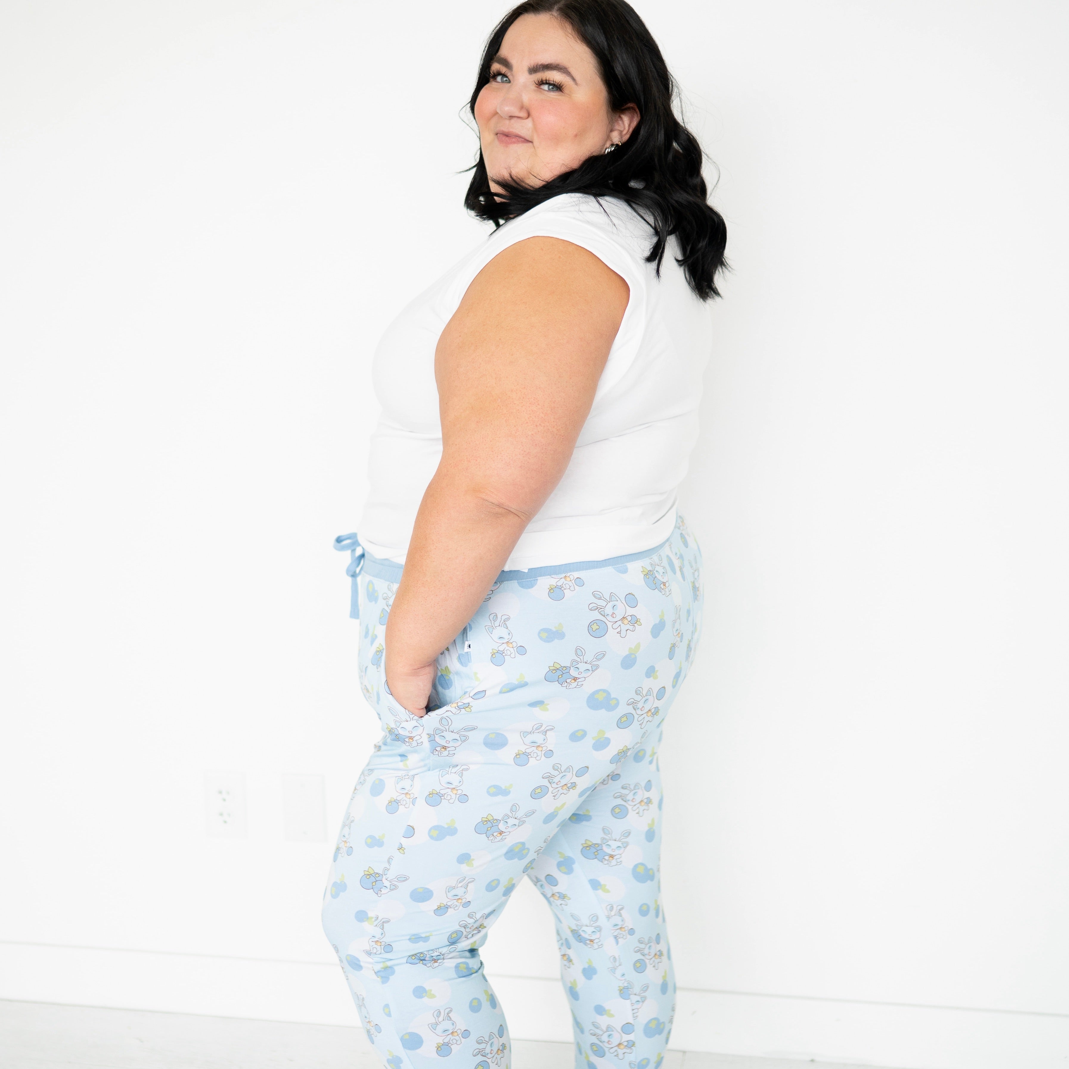 Women's light blue joggers with a blueberry and baby Neopets print.