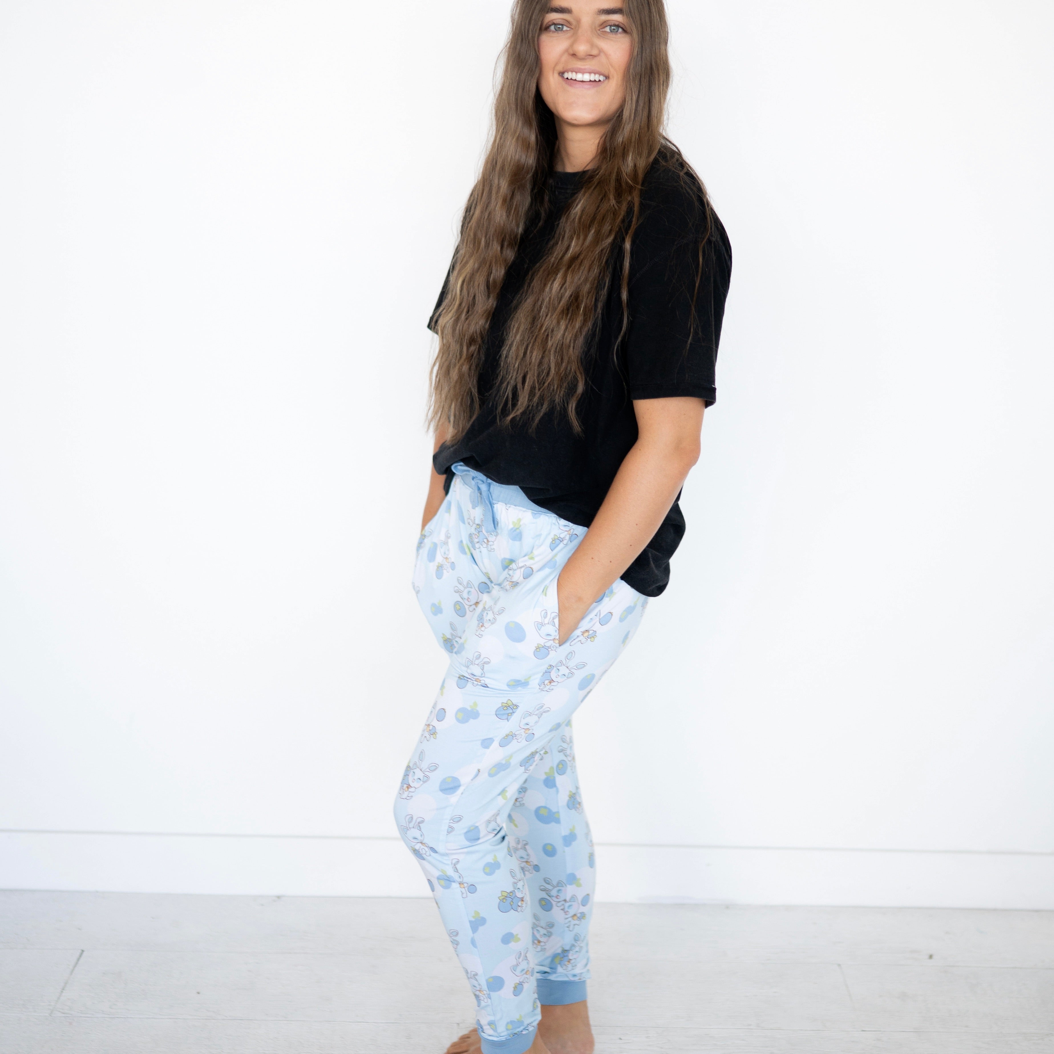 Women's light blue joggers with a blueberry baby Neopets print.