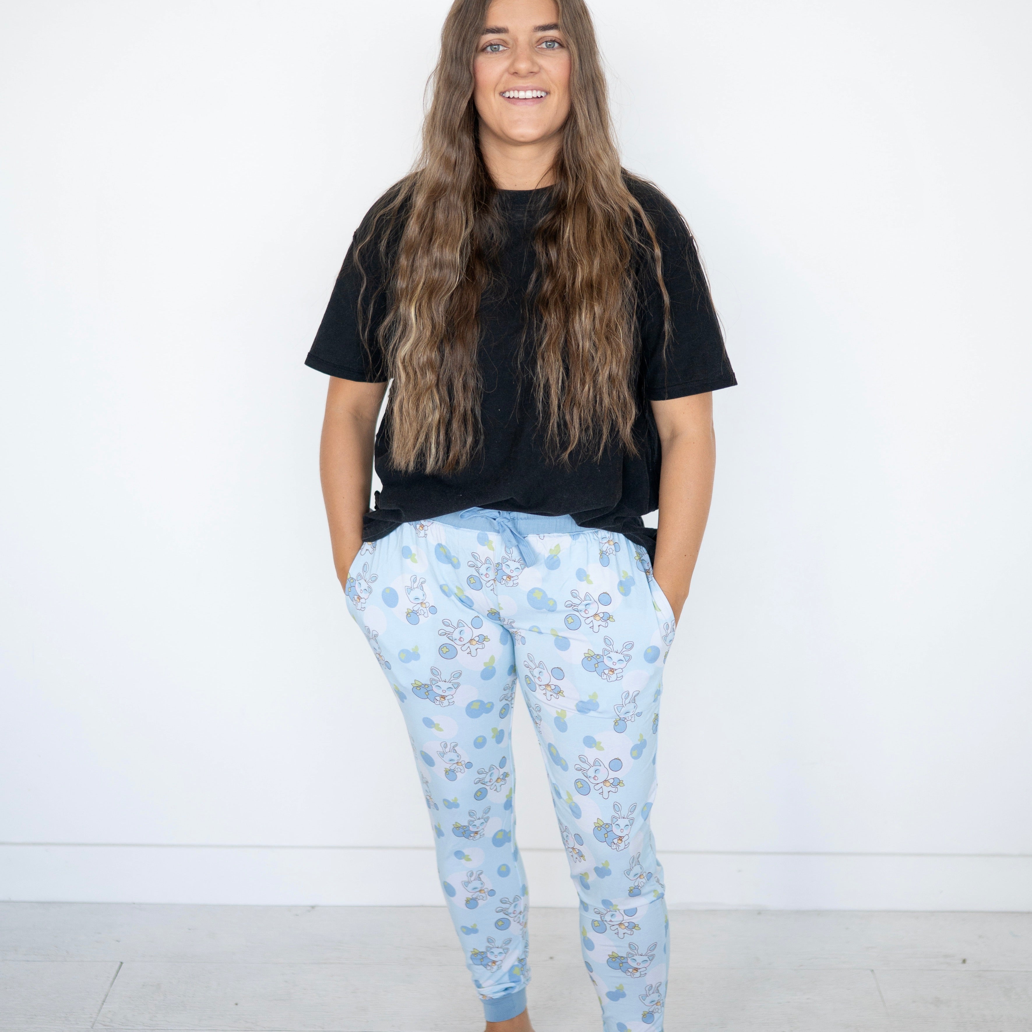 Women's light blue joggers with a blueberry and baby Neopets print.