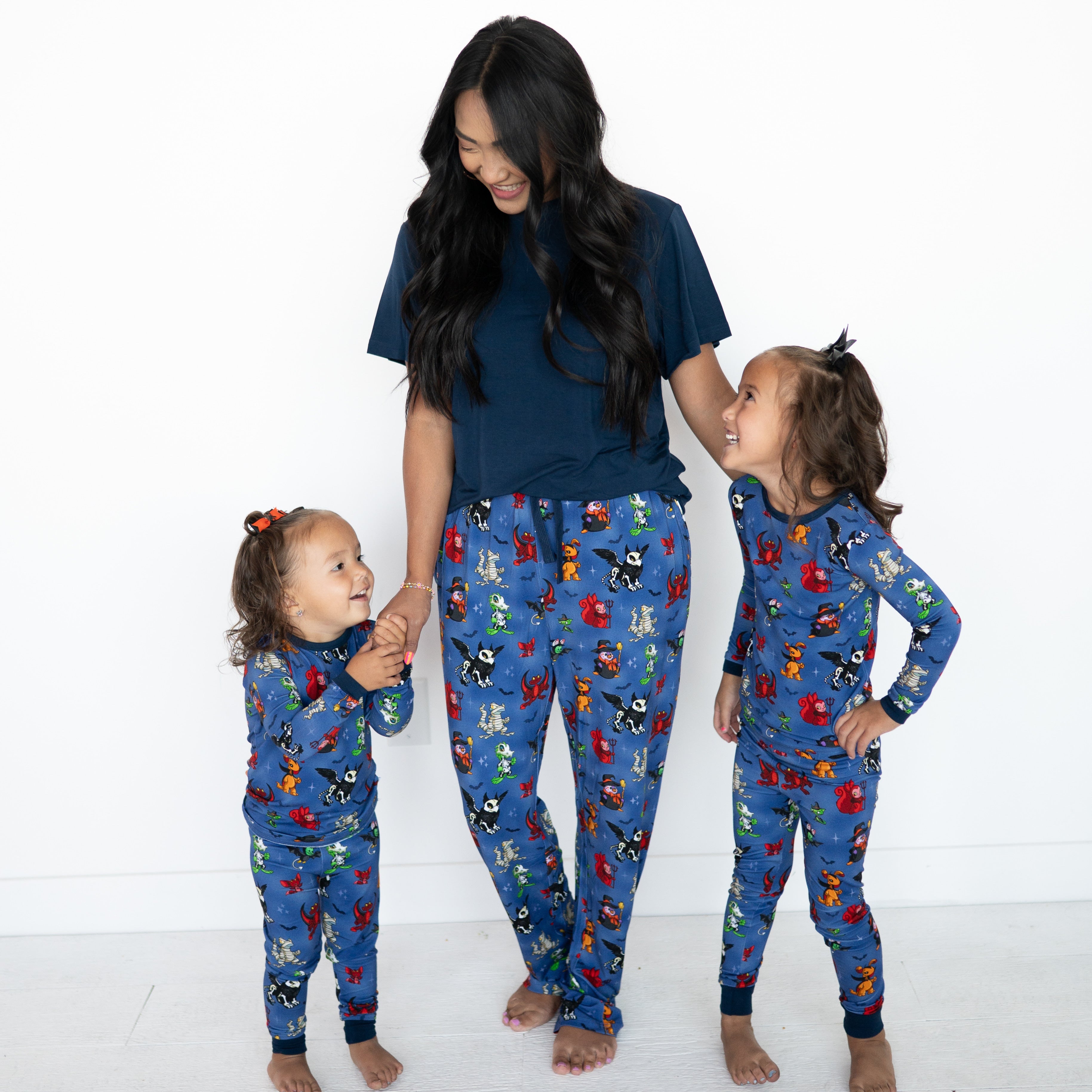 Unisex Halloween-themed Neopets sleep pants with a blue background and cartoon characters.
