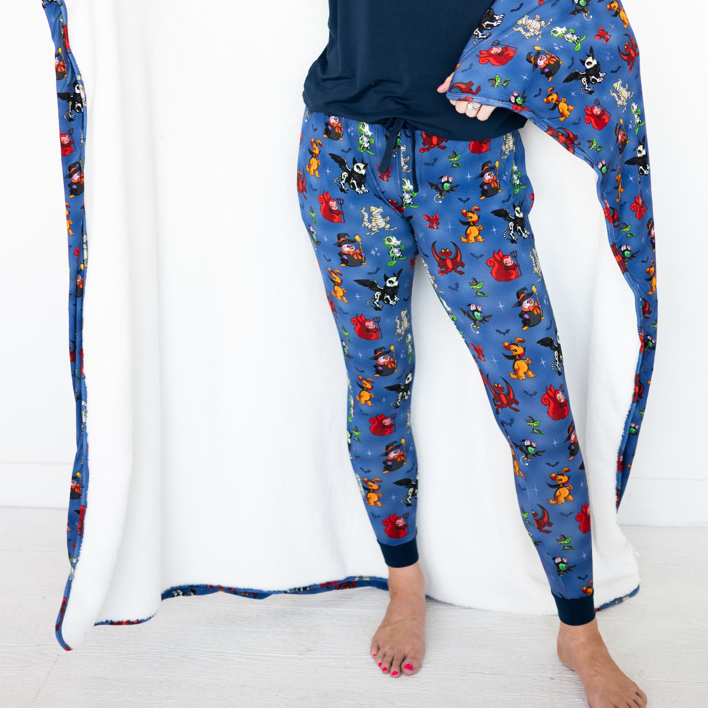 Women's blue joggers with a Halloween Neopets print.