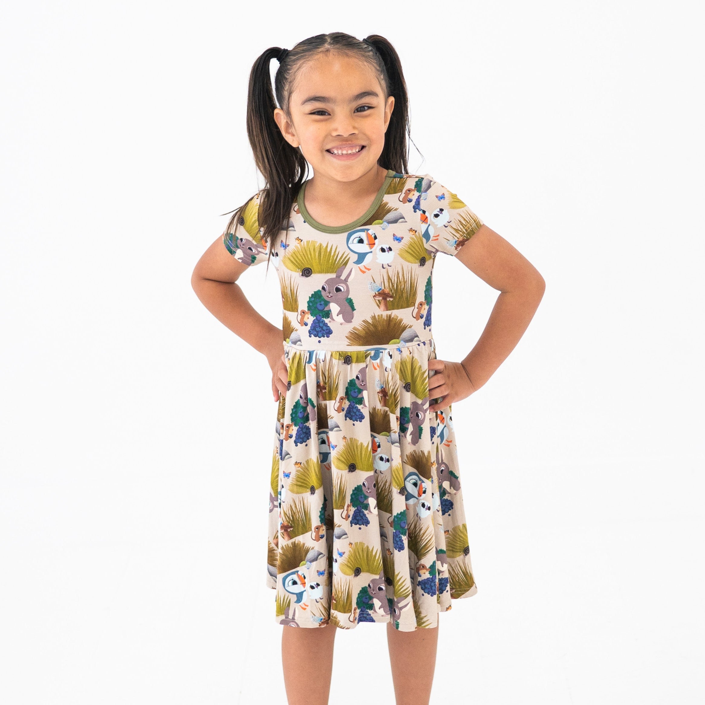 Puffin Rock™ bamboo dress with a playful animal print.