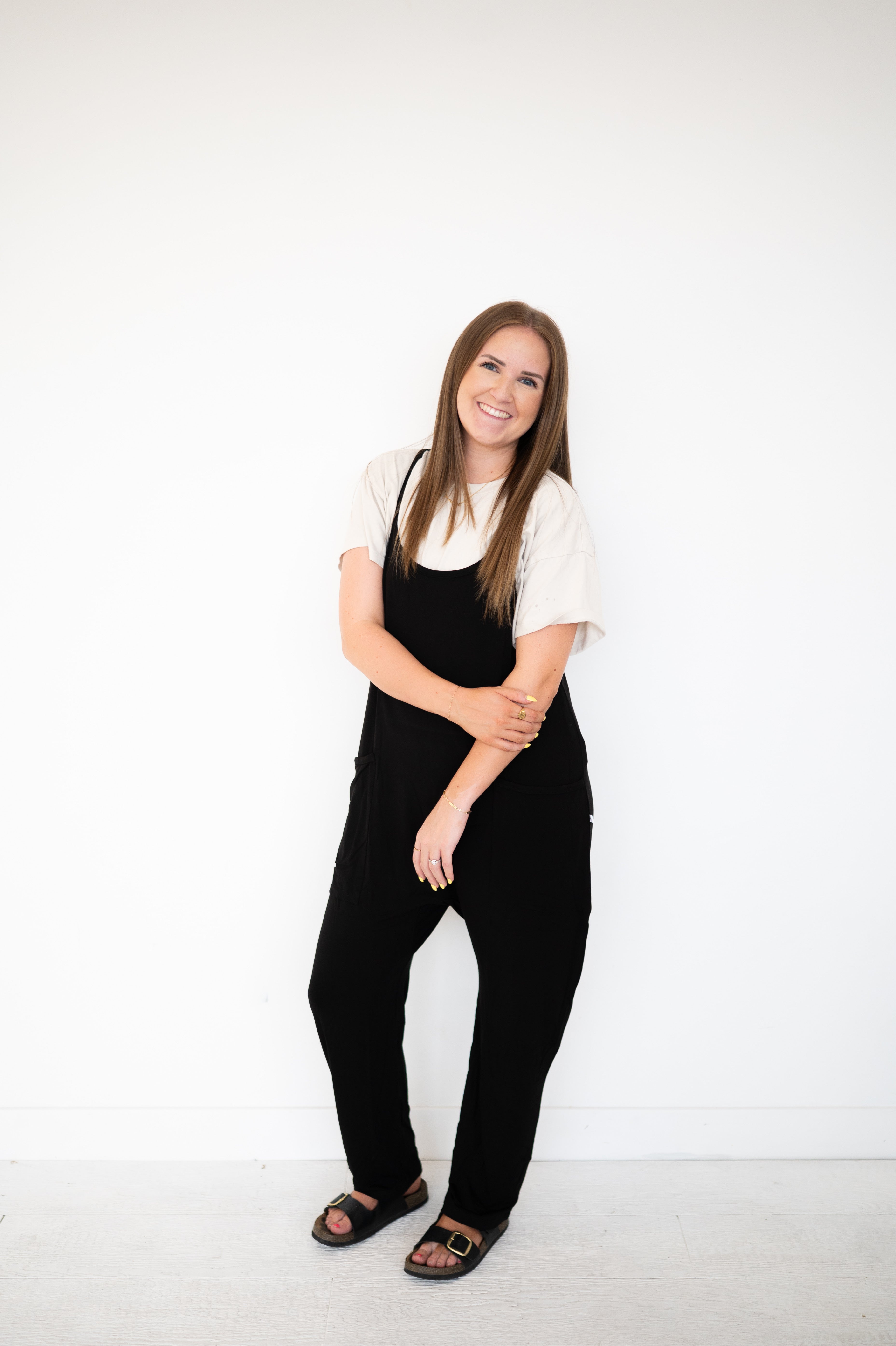 Adult black overalls made of soft bamboo fabric.