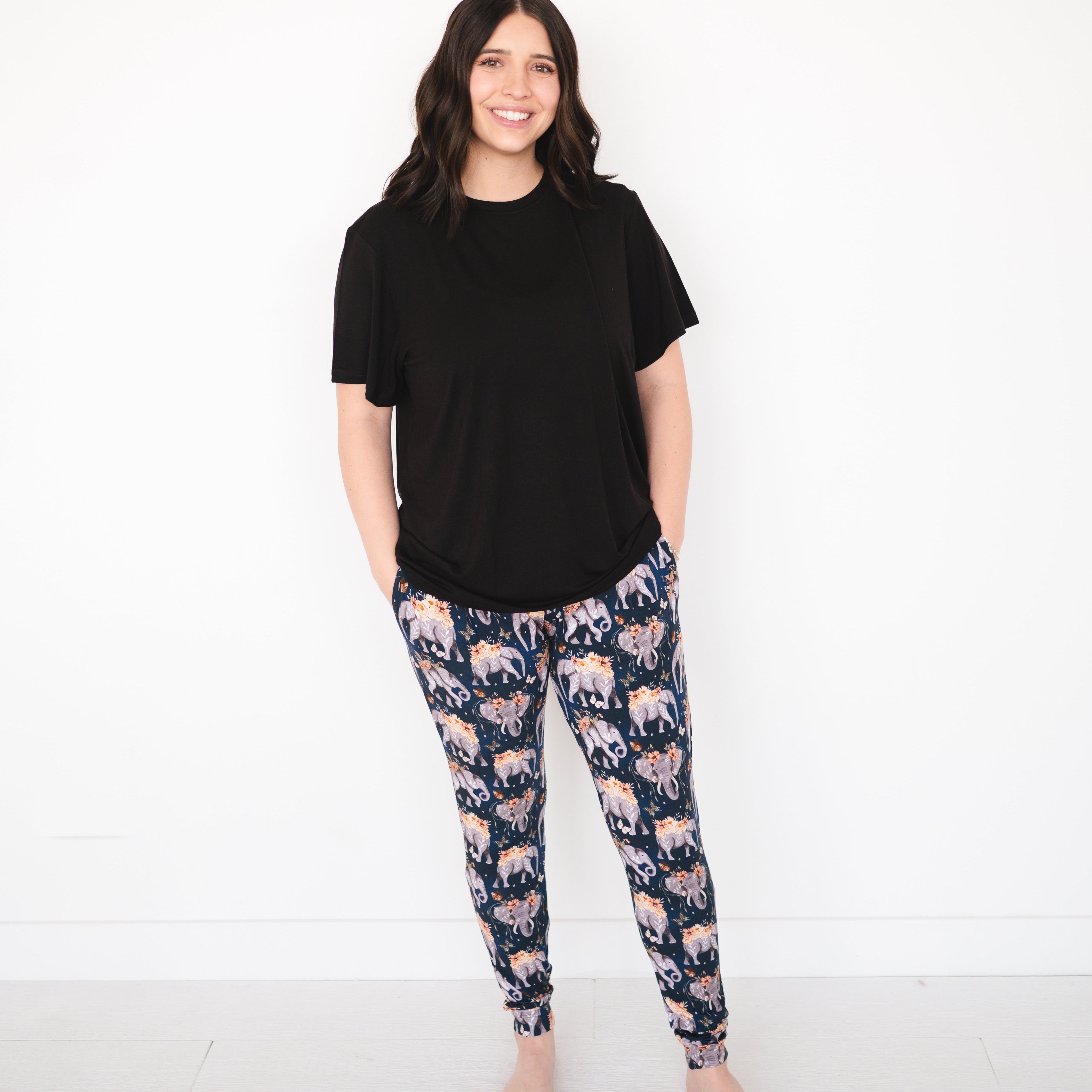 Women's fit jogger pants with an elephant and floral print.