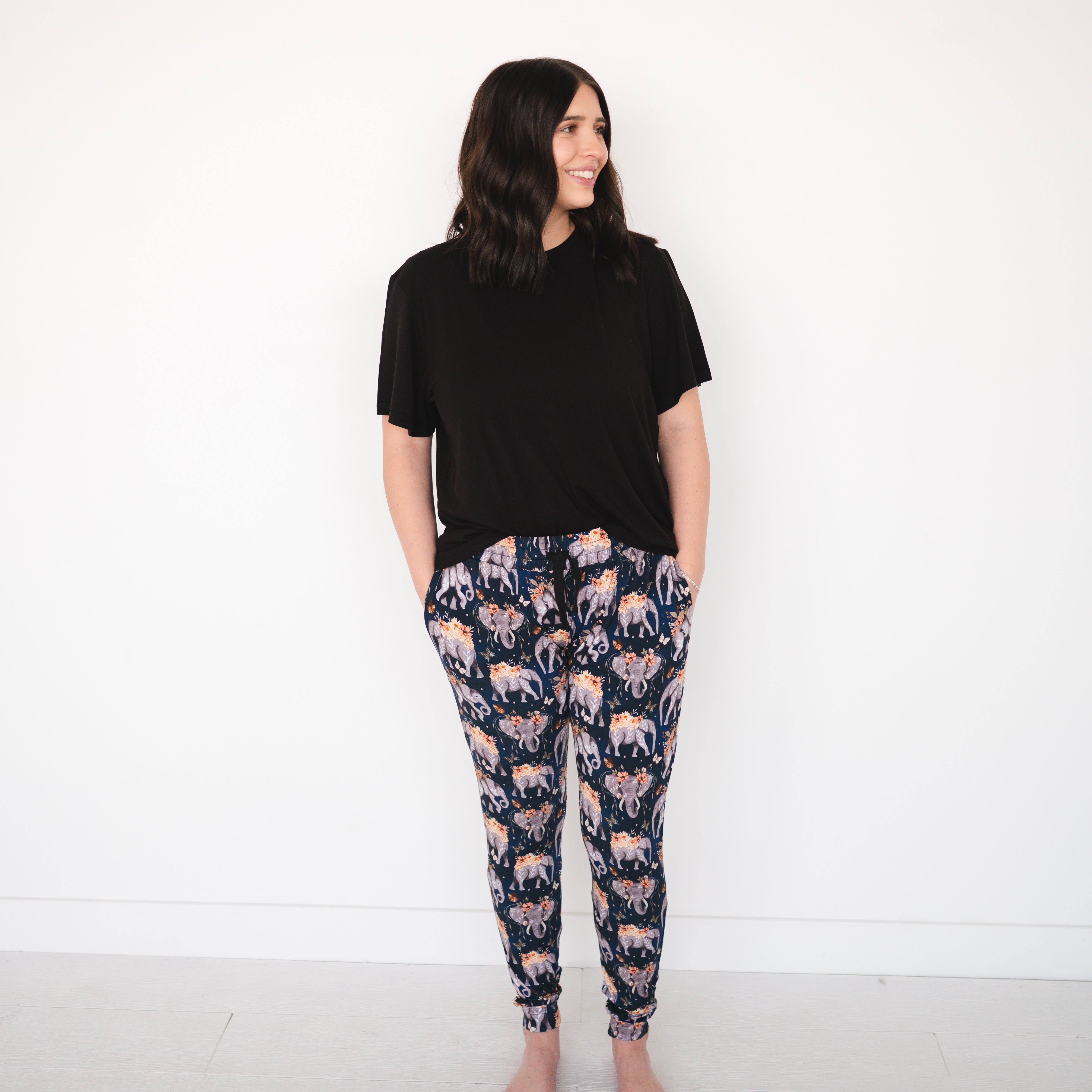 Women's fit jogger pants with an elephant and floral print.