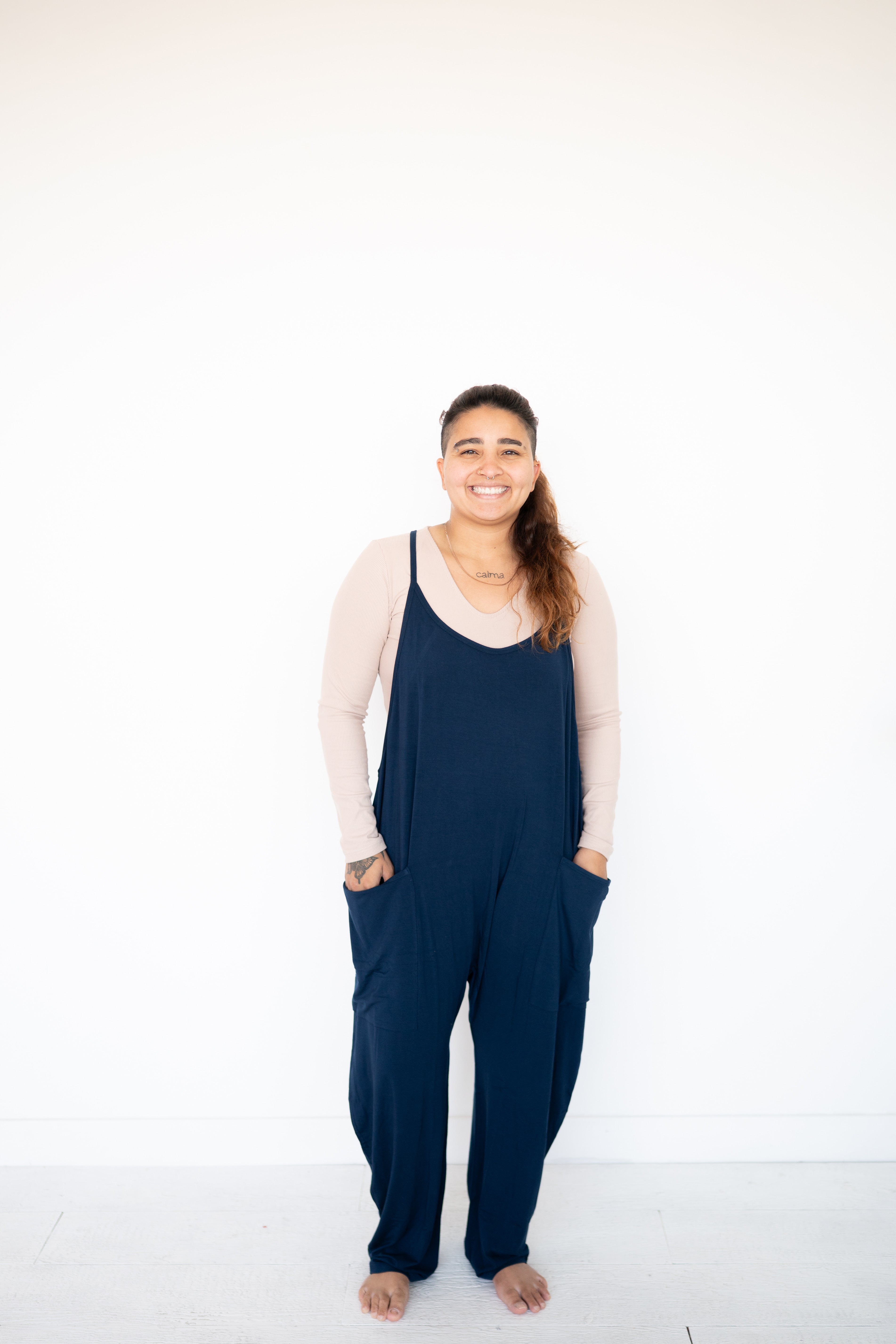Navy luxe bamboo adult overalls with oversized pockets.