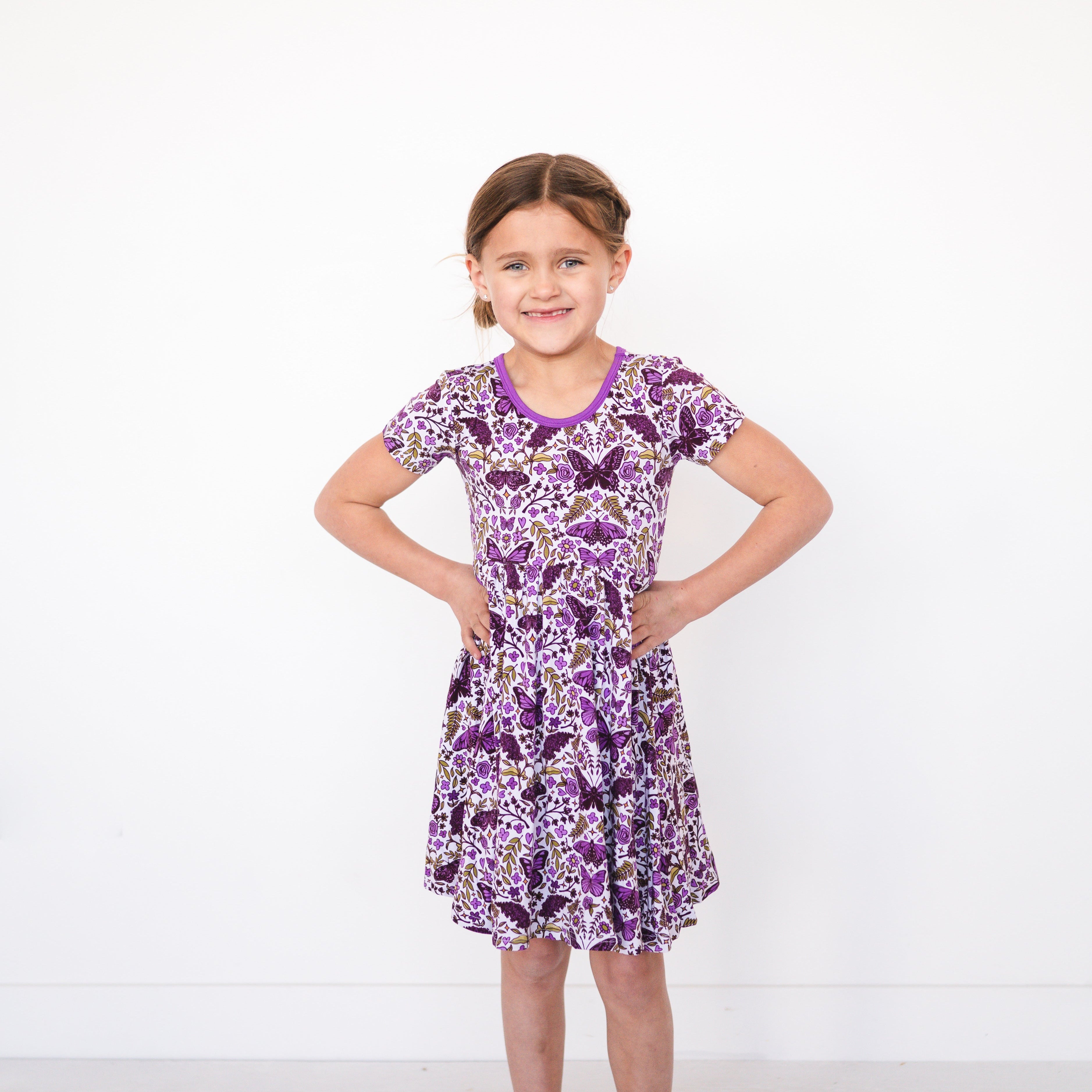 Girl's purple butterfly garden print bamboo dress.