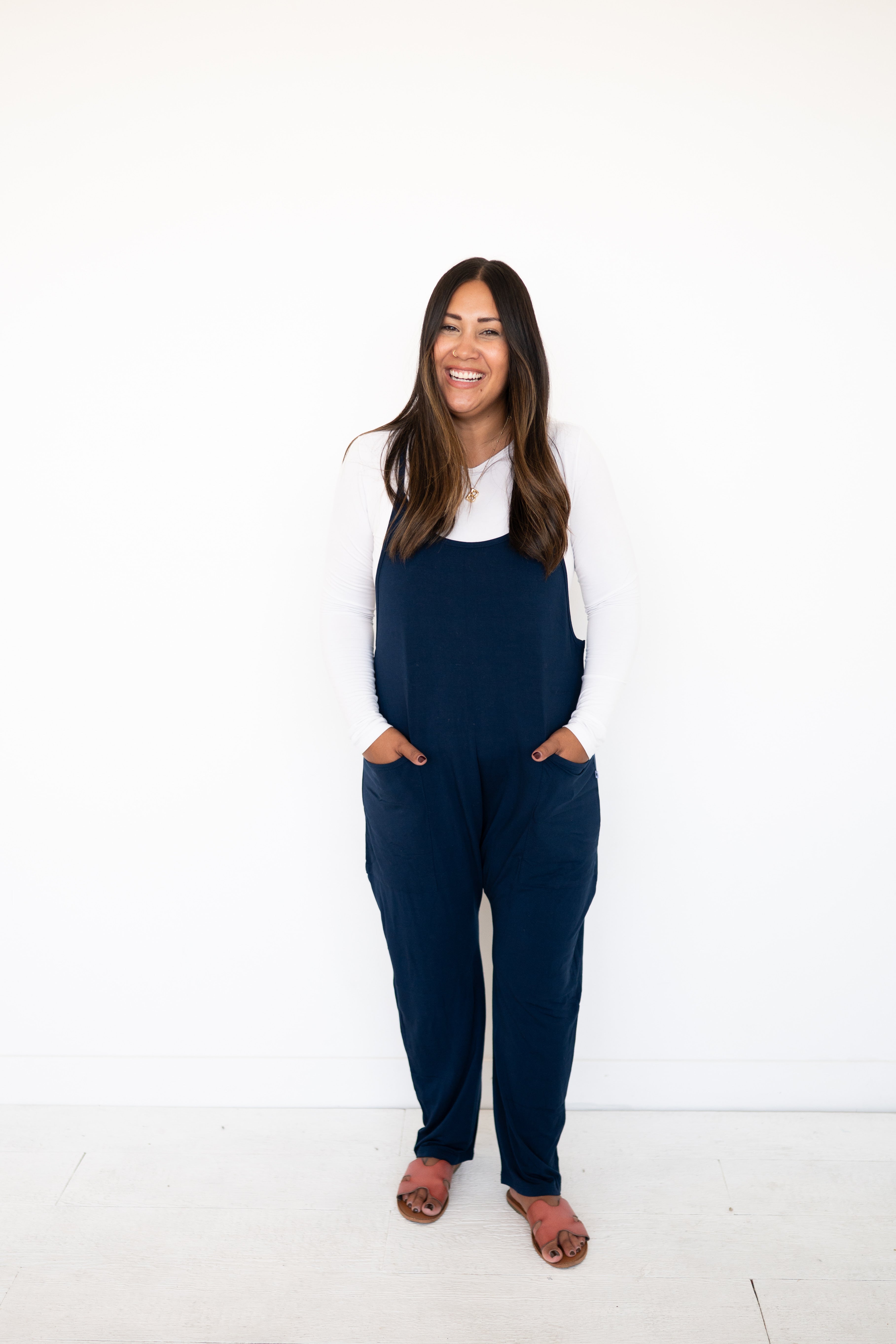 Navy luxe bamboo adult overalls with a racerback and oversized pockets.