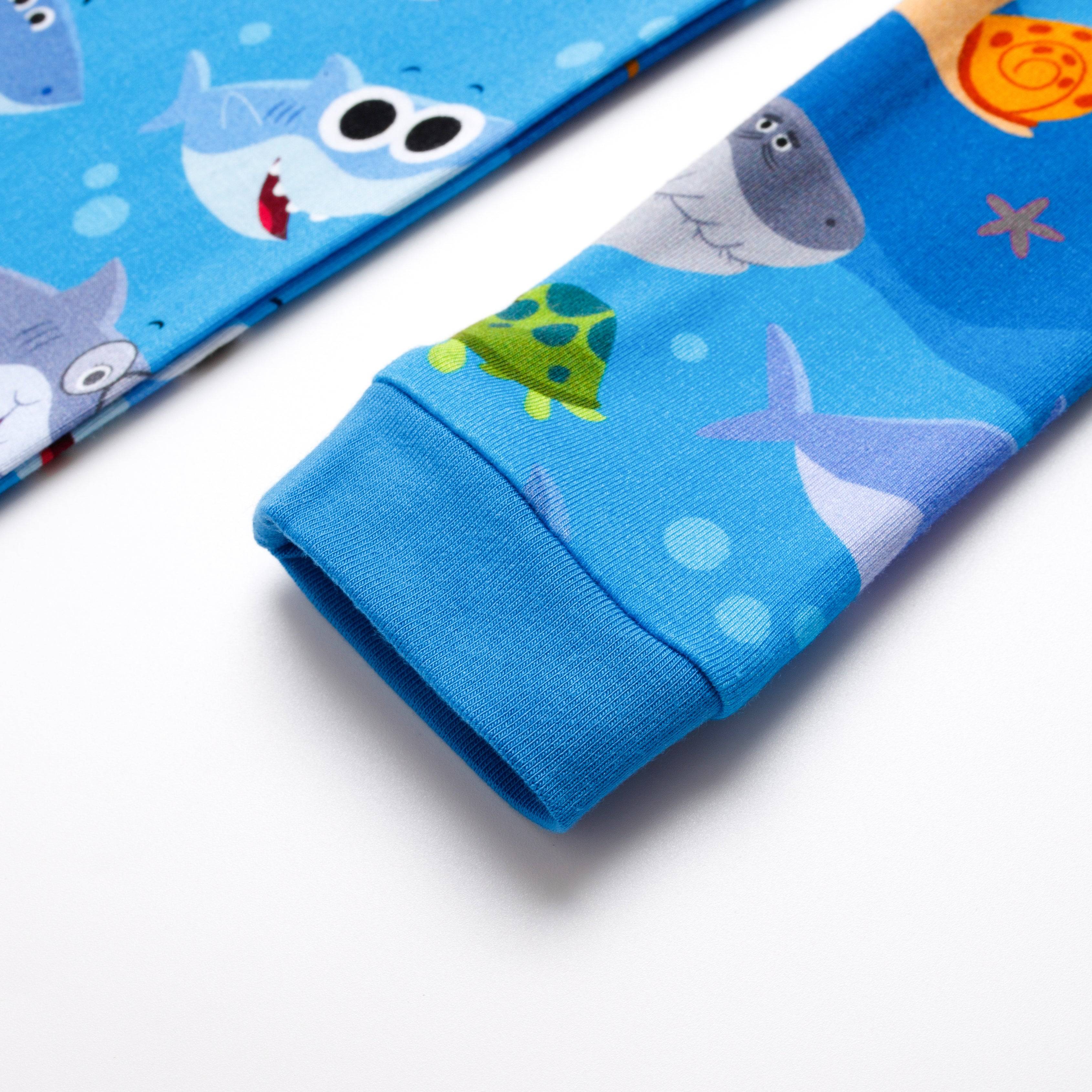 Blue bamboo pajamas with a playful Baby Shark print and a green turtle.