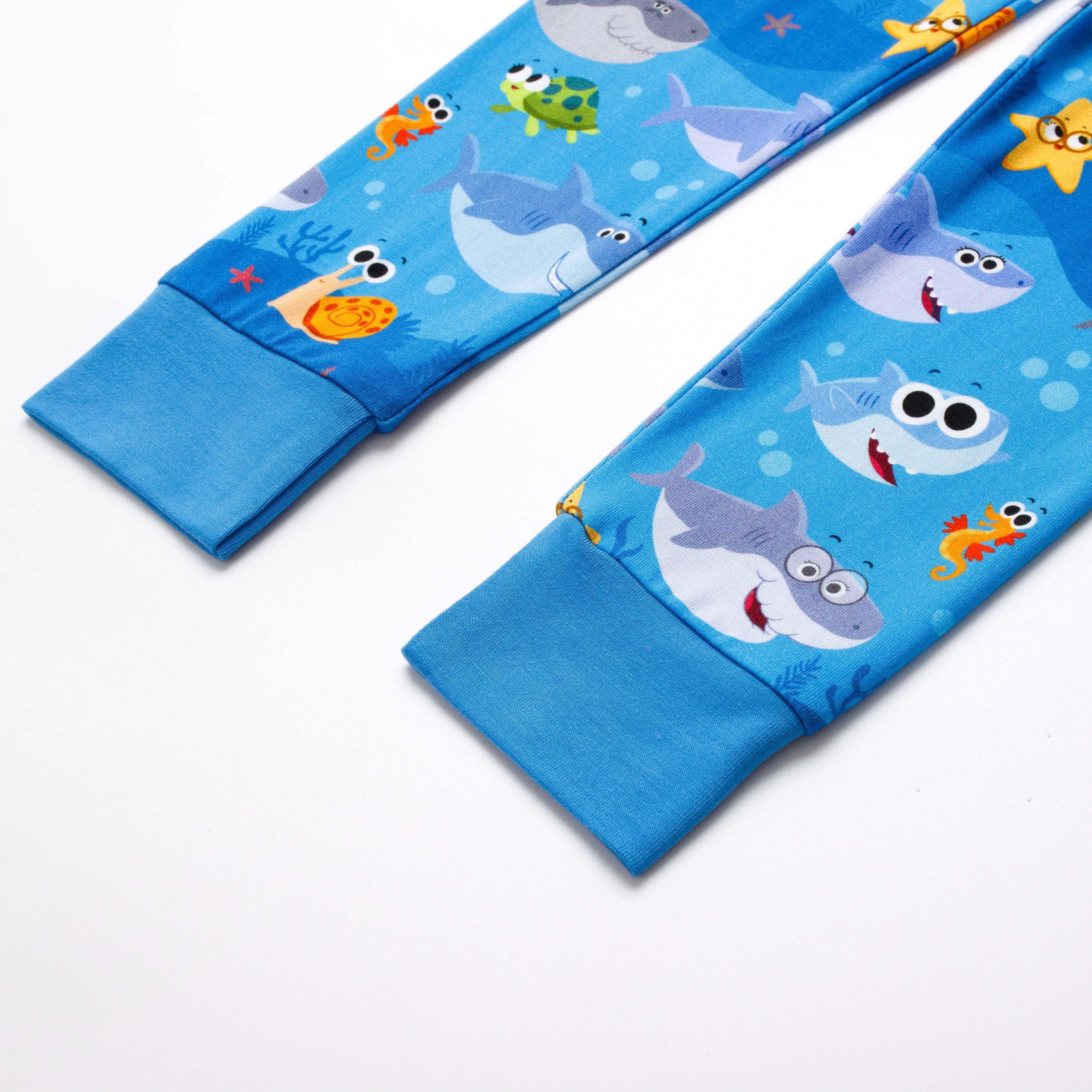 Blue pajama set with a Baby Shark print and ribbed cuffs.