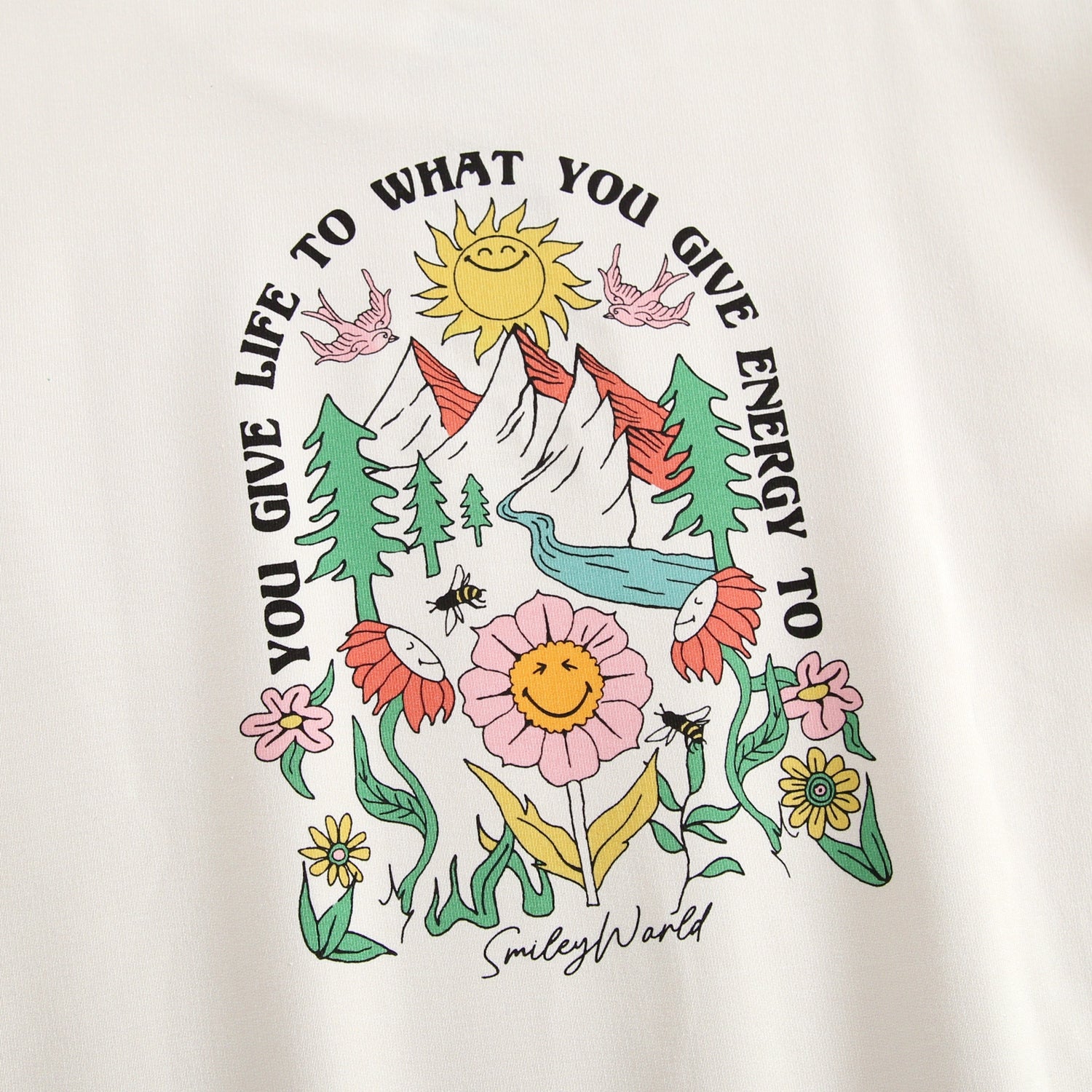 Crewneck sweatshirt with a nature scene and SmileyWorld graphic.