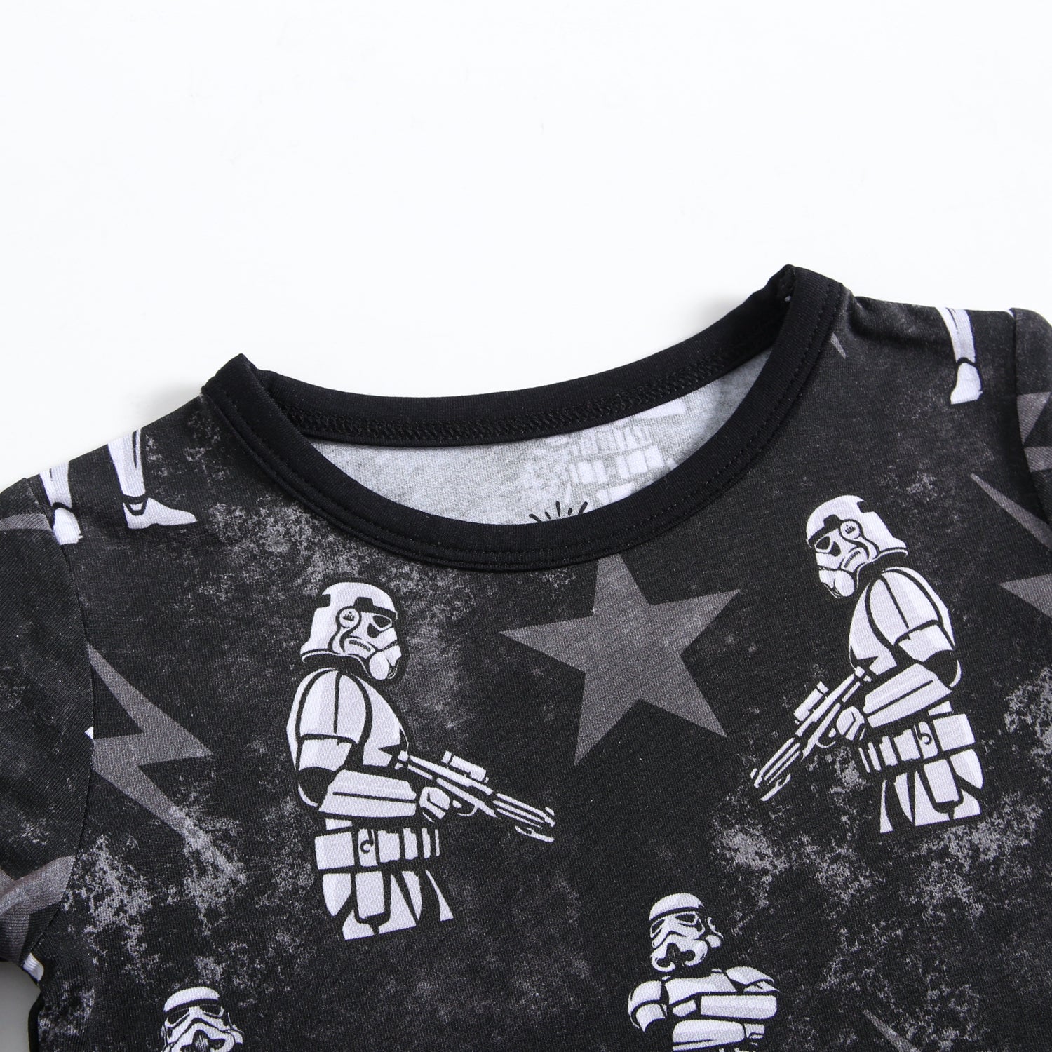 Black t-shirt with a repeating pattern of white stormtroopers and stars.