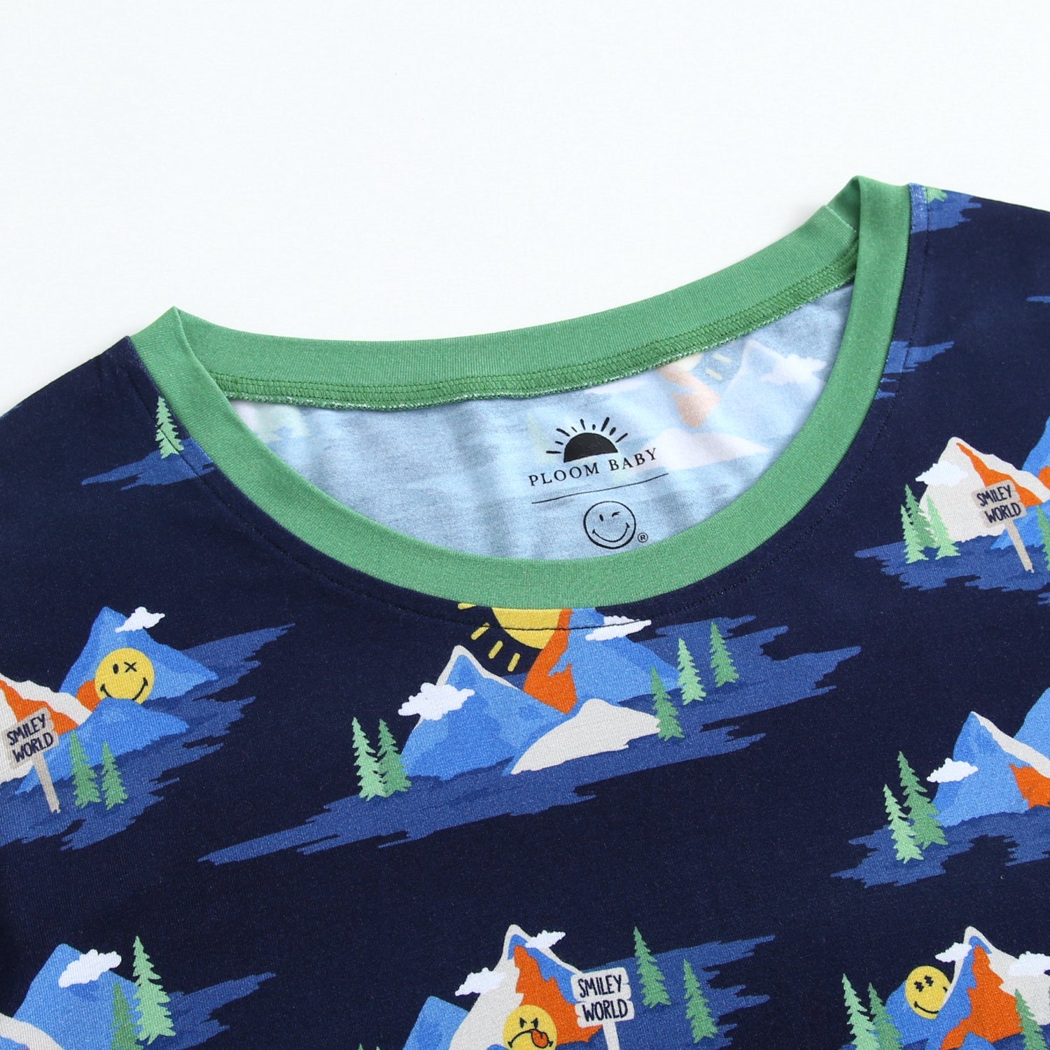 Navy blue t-shirt with a Mount SmileyWorld print and green trim.